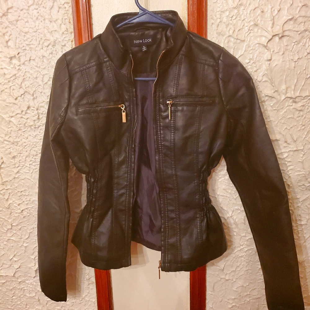 Ladies all black leathers small jacket.